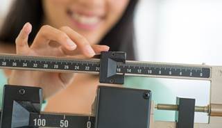 Adults using prescription weight loss drugs lost more weight over the course of a year than those taking a placebo. Adults using prescription weight loss drugs lost more weight over the course of a year than those taking a placebo.