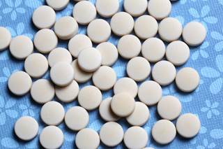 White oral medication. White oral medication.